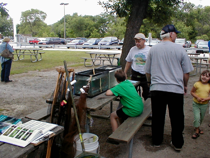 Scott Davis explaining native fish to residents of Brookfield, IL